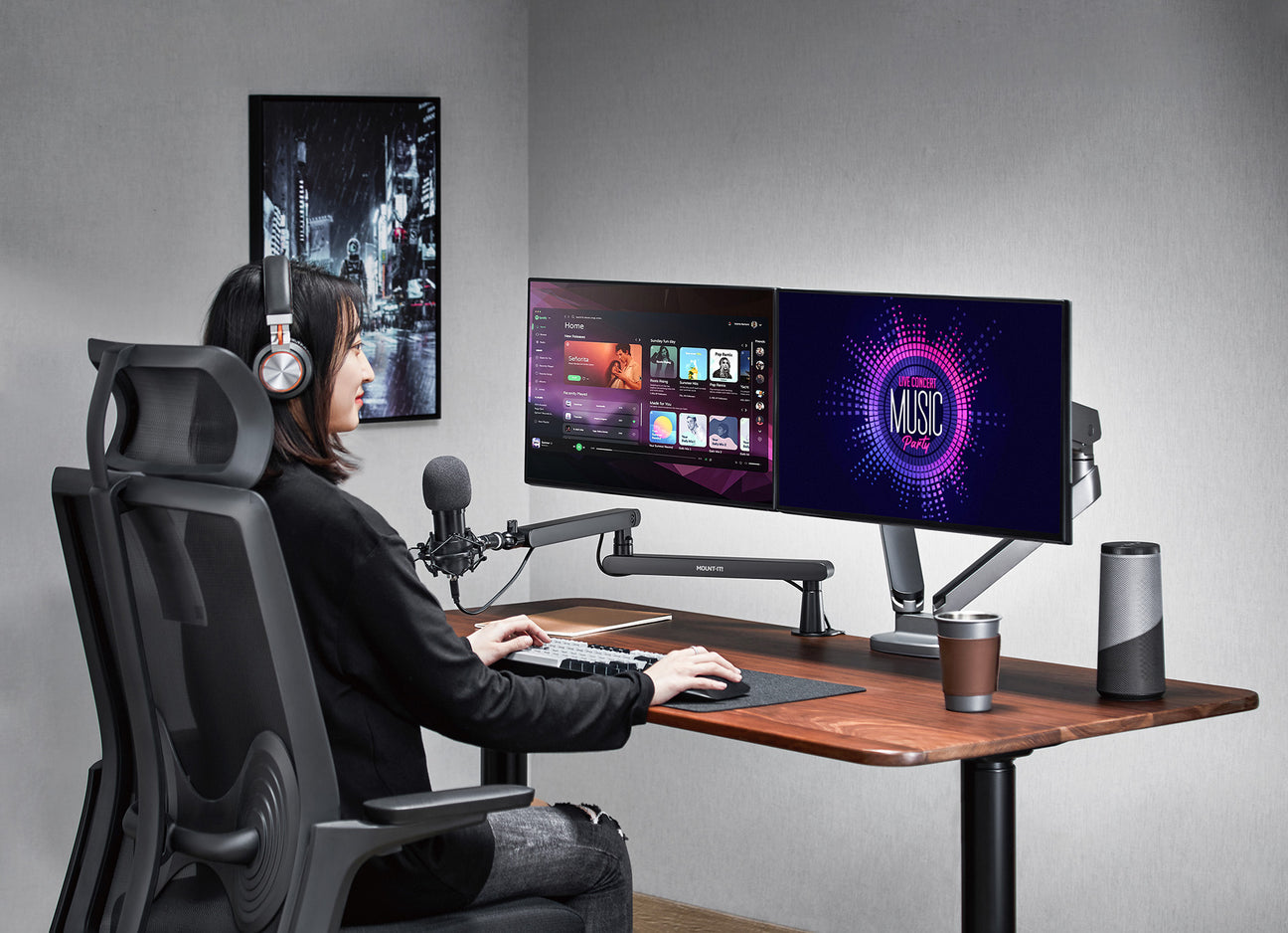 a woman sitting at a desk with headphones on