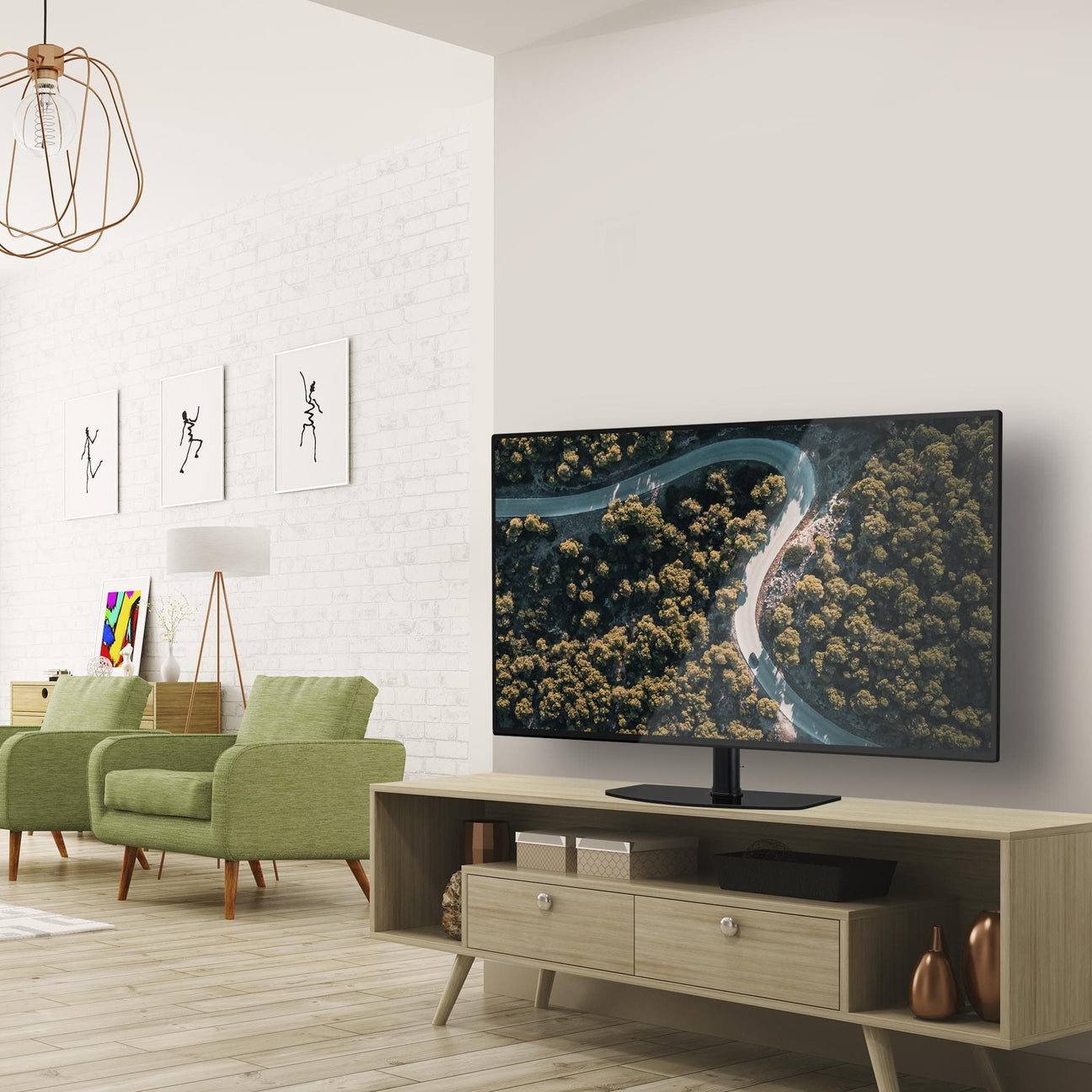 a flat screen tv sitting on top of a wooden dresser