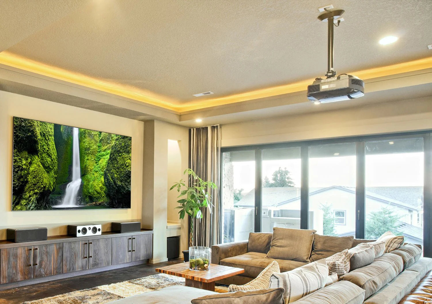 a living room filled with furniture and a flat screen tv