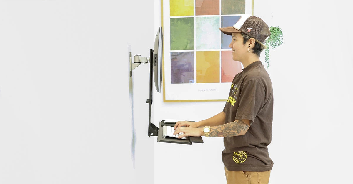 person using a Wall Mounted Desks