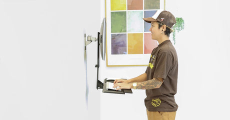 person using a Wall Mounted Desks